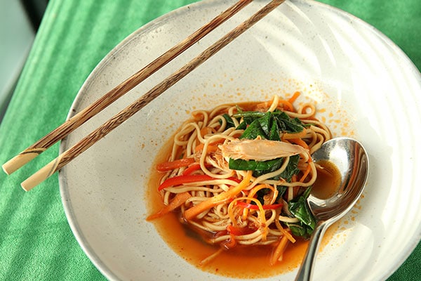 Korean spiced rabbit legs with rice noodles