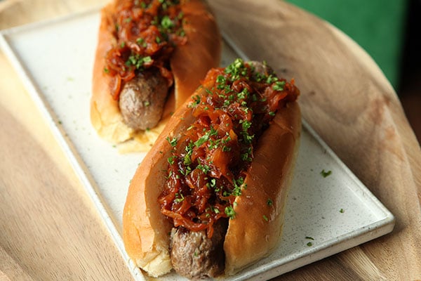 Venison hot dogs with onions