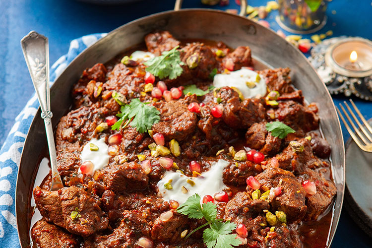Spiced wild boar tagine with cherries and pistachios