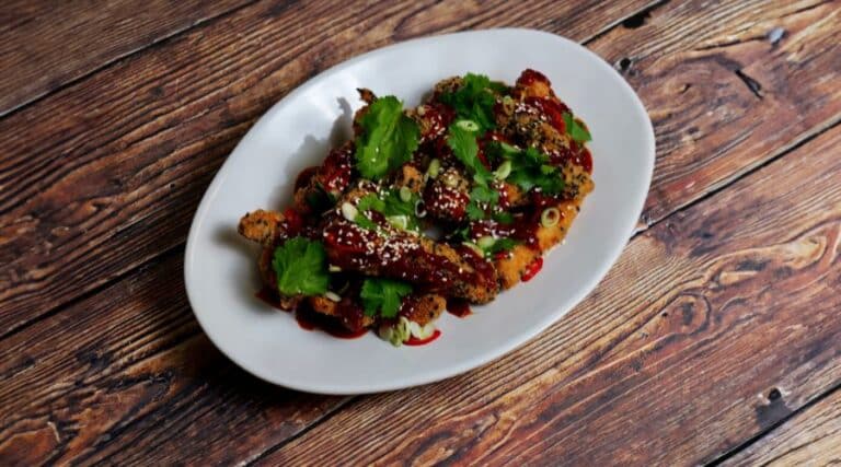 Sesame crusted pheasant goujons, hot honey sauce and coriander