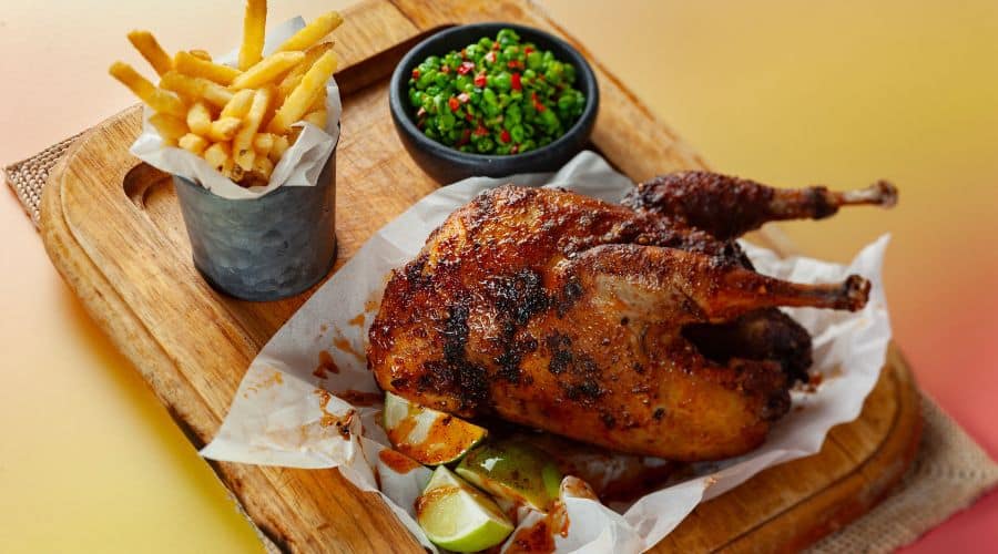 Cheeky piri piri pheasant with macho peas